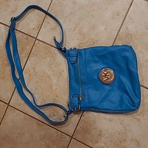 Michael Kors turquoise over the shoulder bag